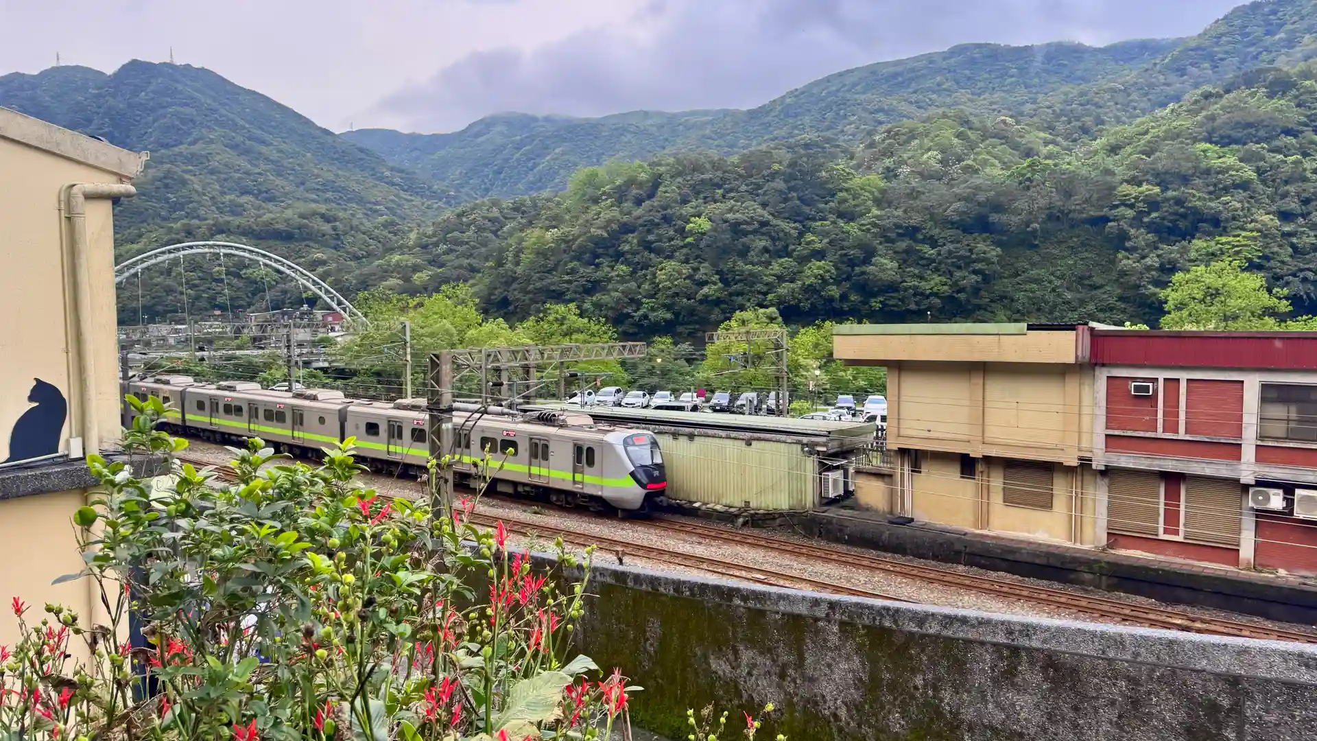 A local train passing through Houtong, Taiwan.