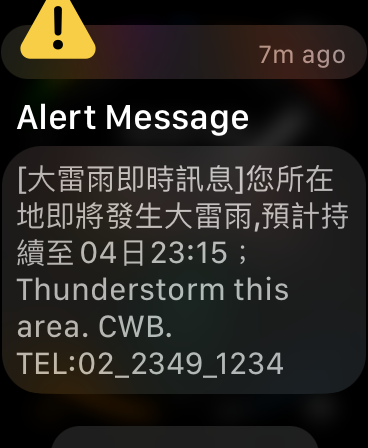 Screenshot of an emergency alert on an Apple Watch. It reads “［大雷雨即時訊息］您所在地即將發生大雷雨，預計持續至04日23:15； Thunderstorm this area. CWB. TEL:02_2349_1234”.