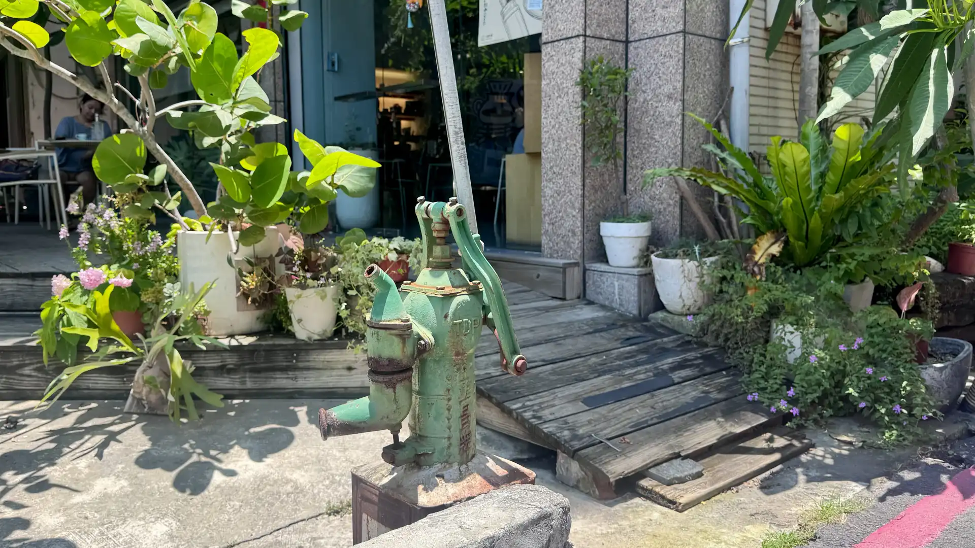 A cast-iron antique hand-operate water pump in Kaohsiung, Taiwan.