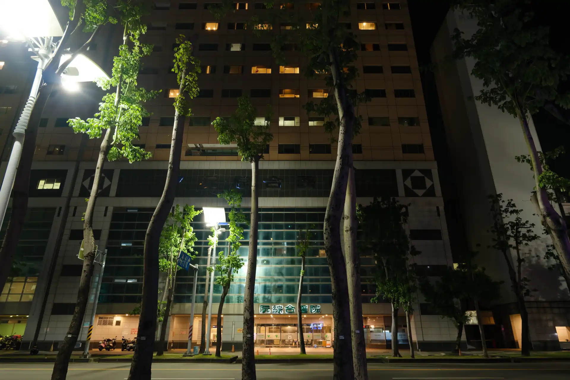 Yuan’s General Hospital main entrance at night.
