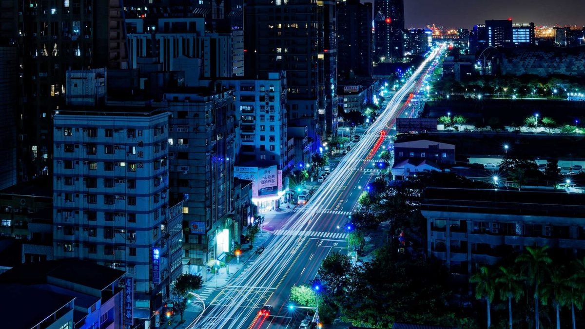 Long exposure of night-time traffic on a six-lane road in Kaohsiung, Taiwan.