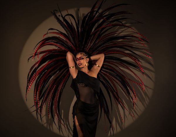 The sultry stylings of Qu'in de la Noche come to our Triple Gala