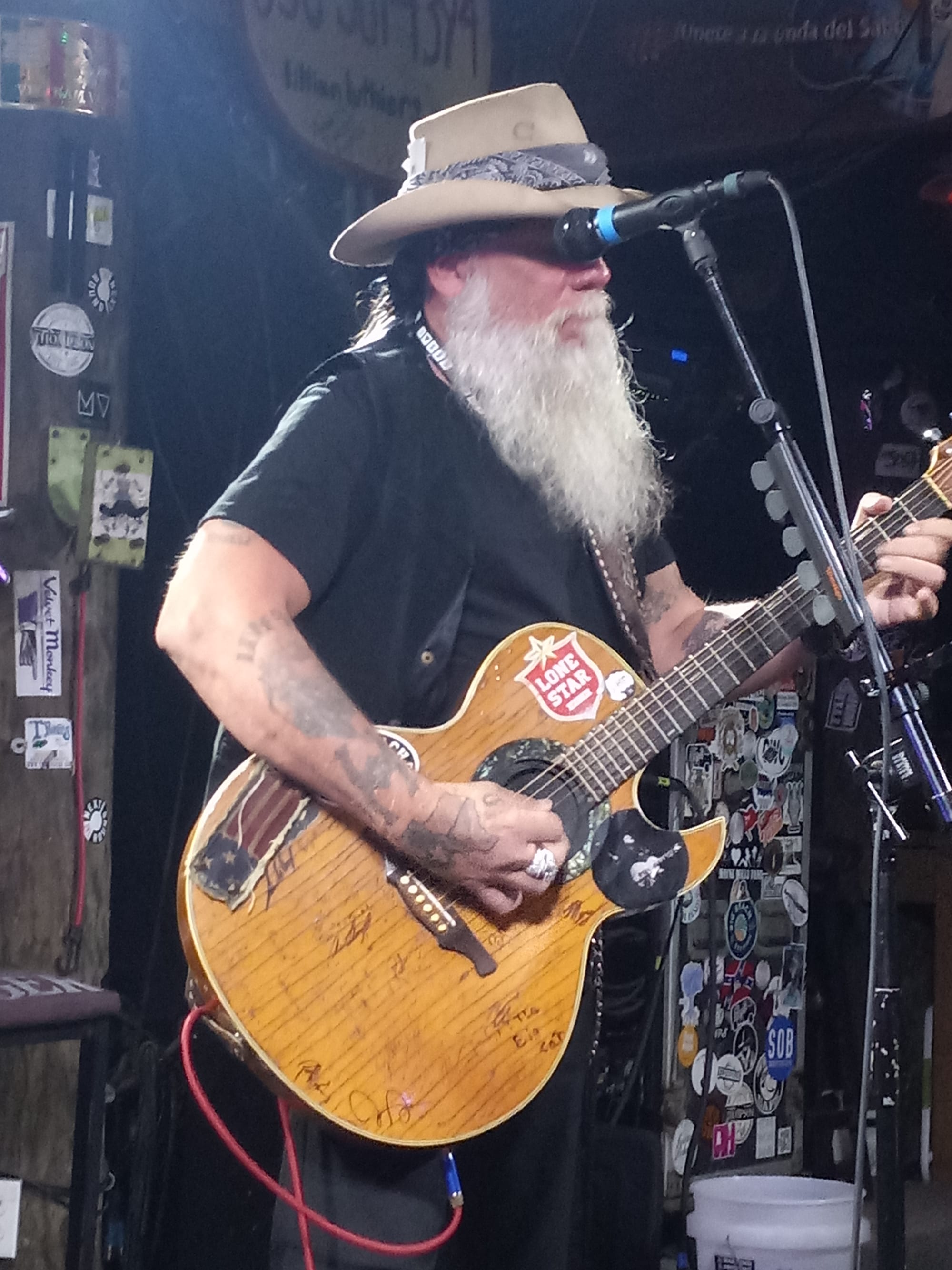 Dallas Moore tuning a bit before showtime