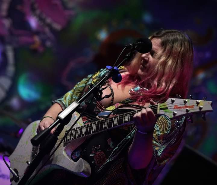 Renee Amelia playing a "Jesse" altered guitar