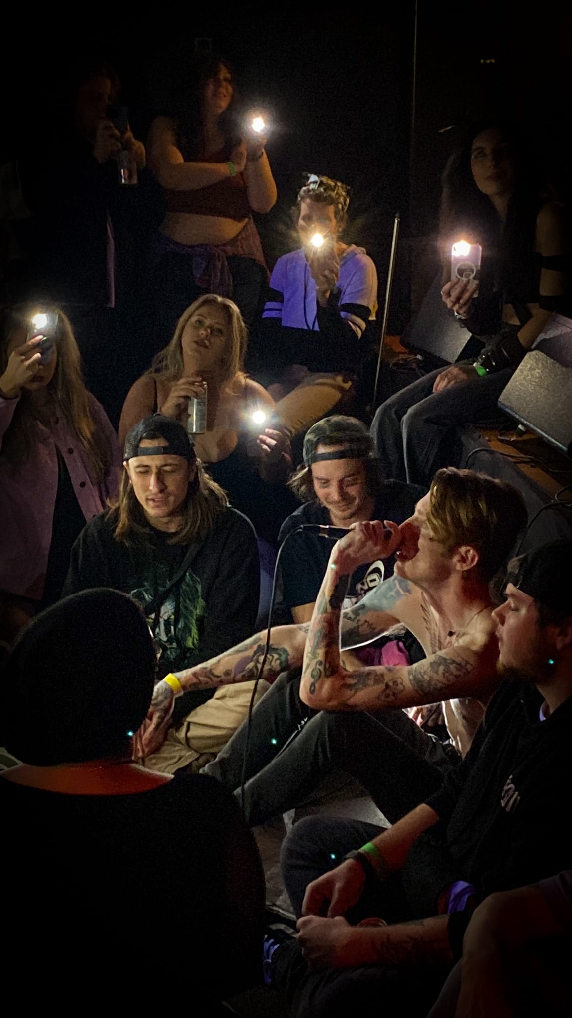 Sam Betancourt&nbsp;sits and sings in the crowd during Overnight's set at the Alabama Music Box. (Photo: Tandra Smith)