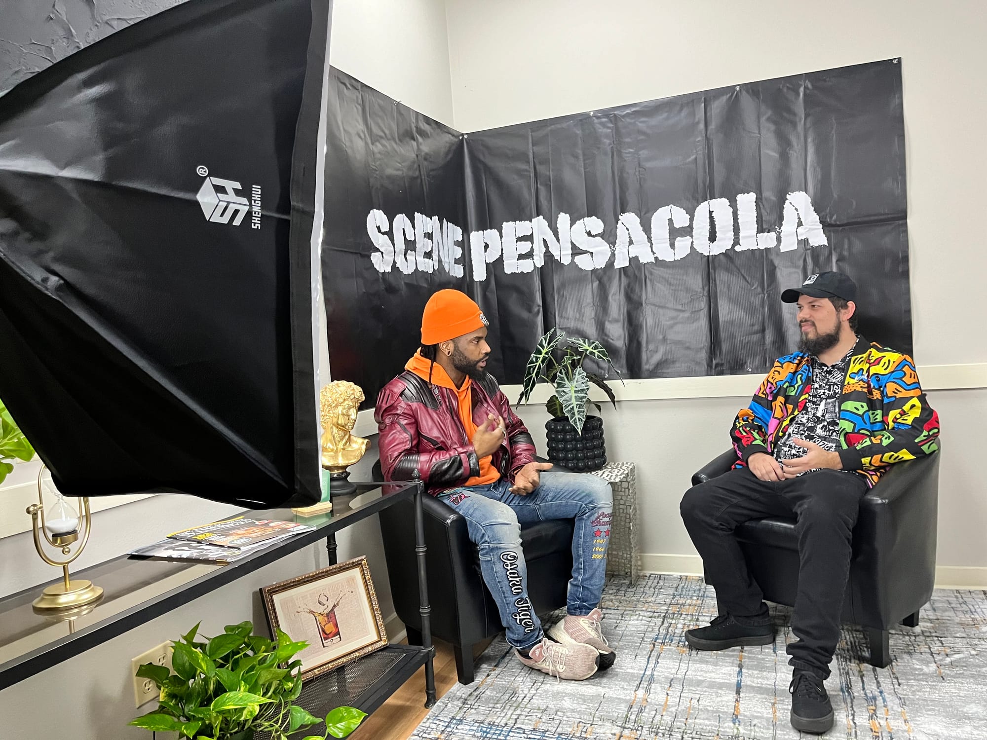 Travis from Wildcharge with Tim in the Scene Pensacola studio.