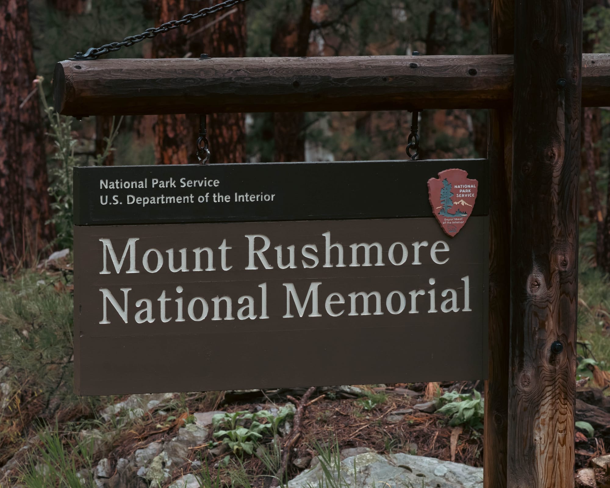 Mount Rushmore National Memorial entrance sign in the Black Hills of South Dakota.