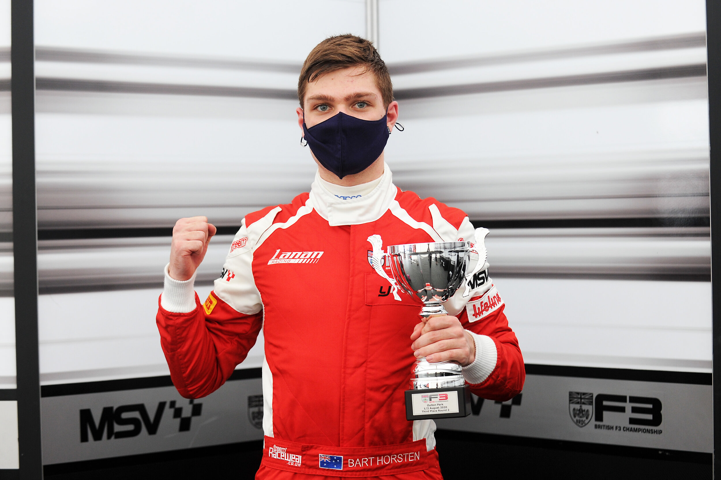 Bart Horsten stands on the BRDC British Formula 3 podium at Oulton Park. (Image: Supplied/Jakob Ebrey)
