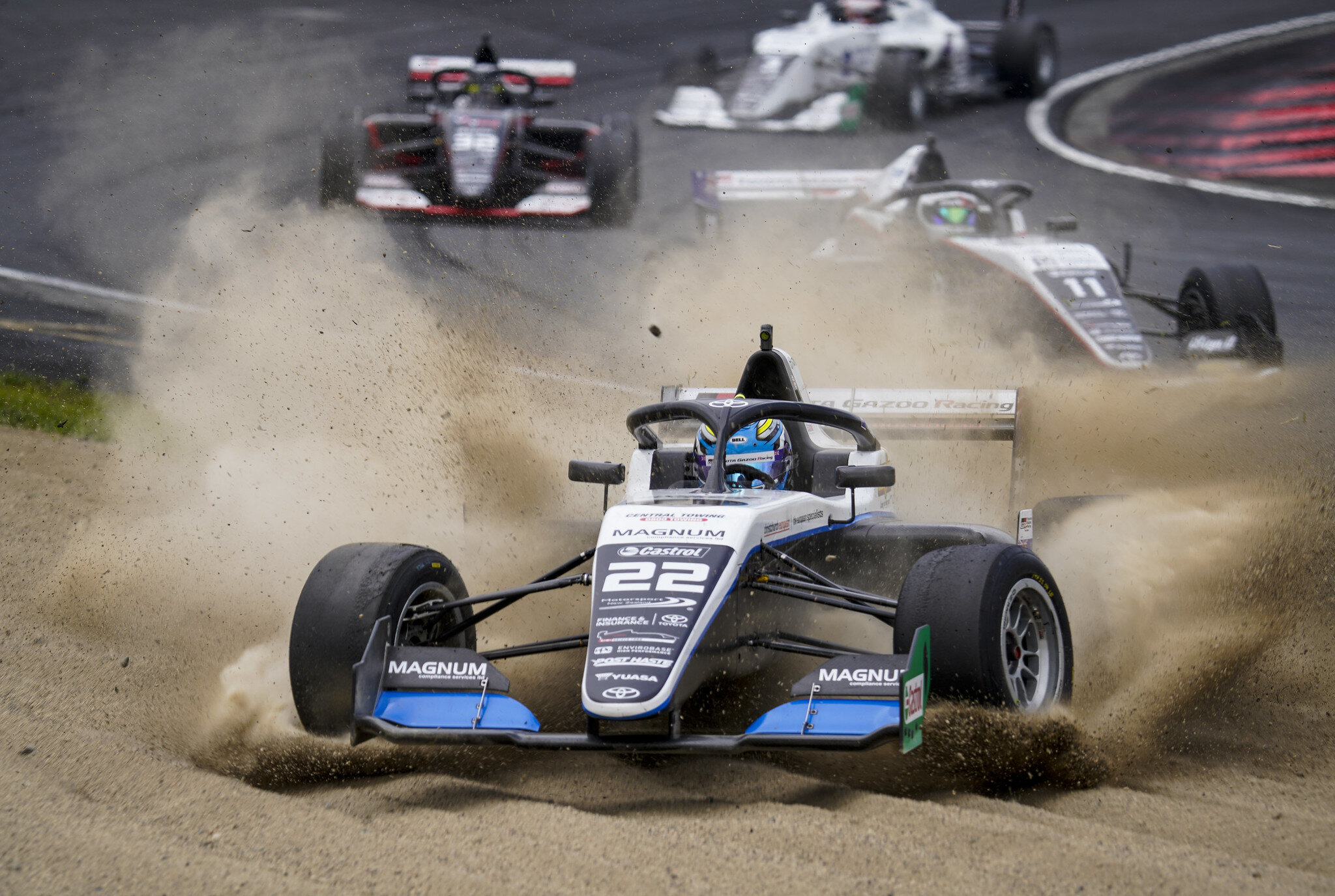 Tom Alexander is stranded in the gravel during Race 2 of the Toyota Racing Series. (Image: John Cowpland/TGRNZ)