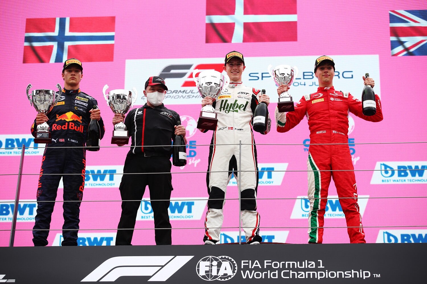 Frederik Vesti, Dennis Hauger, and Olli Caldwell celebrate on the podium. (Formula Motorsport)