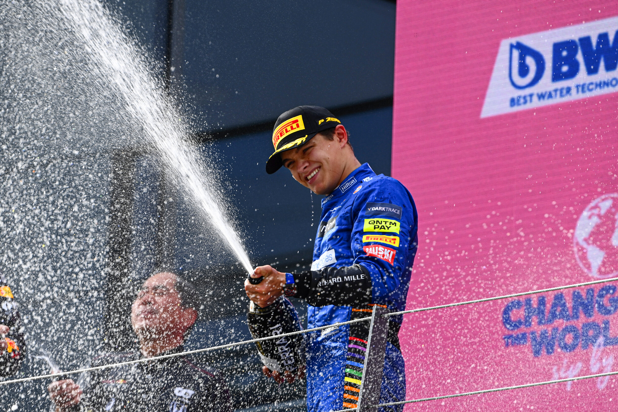 Lando Norris celebrates on the podium at the Red Bull Ring. (Motorsport Images/McLaren)