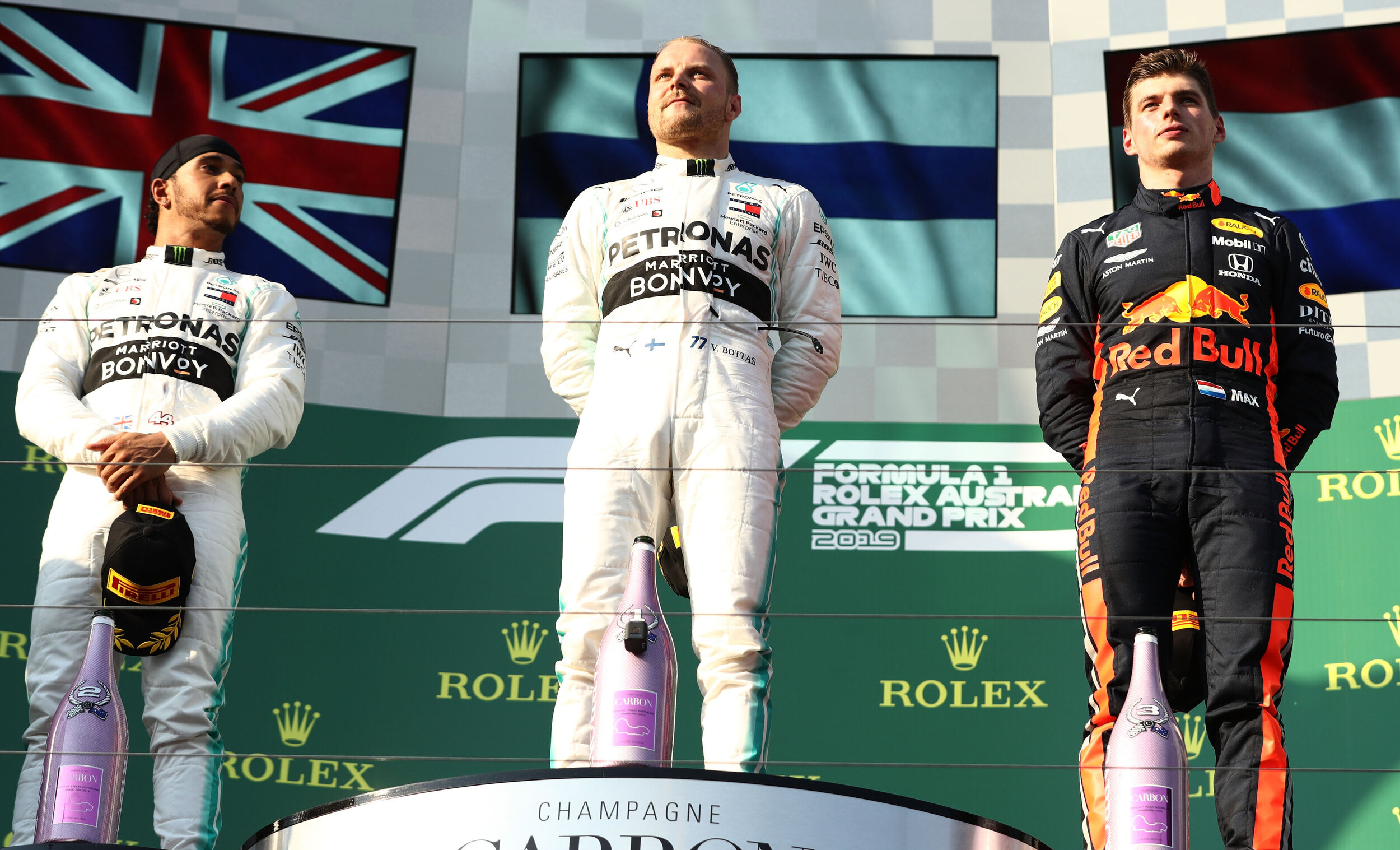 Valtteri Bottas, Lewis Hamilton, and Max Verstappen on the Australian Grand Prix podium in 2019. (Getty Images/Red Bull Content Pool)