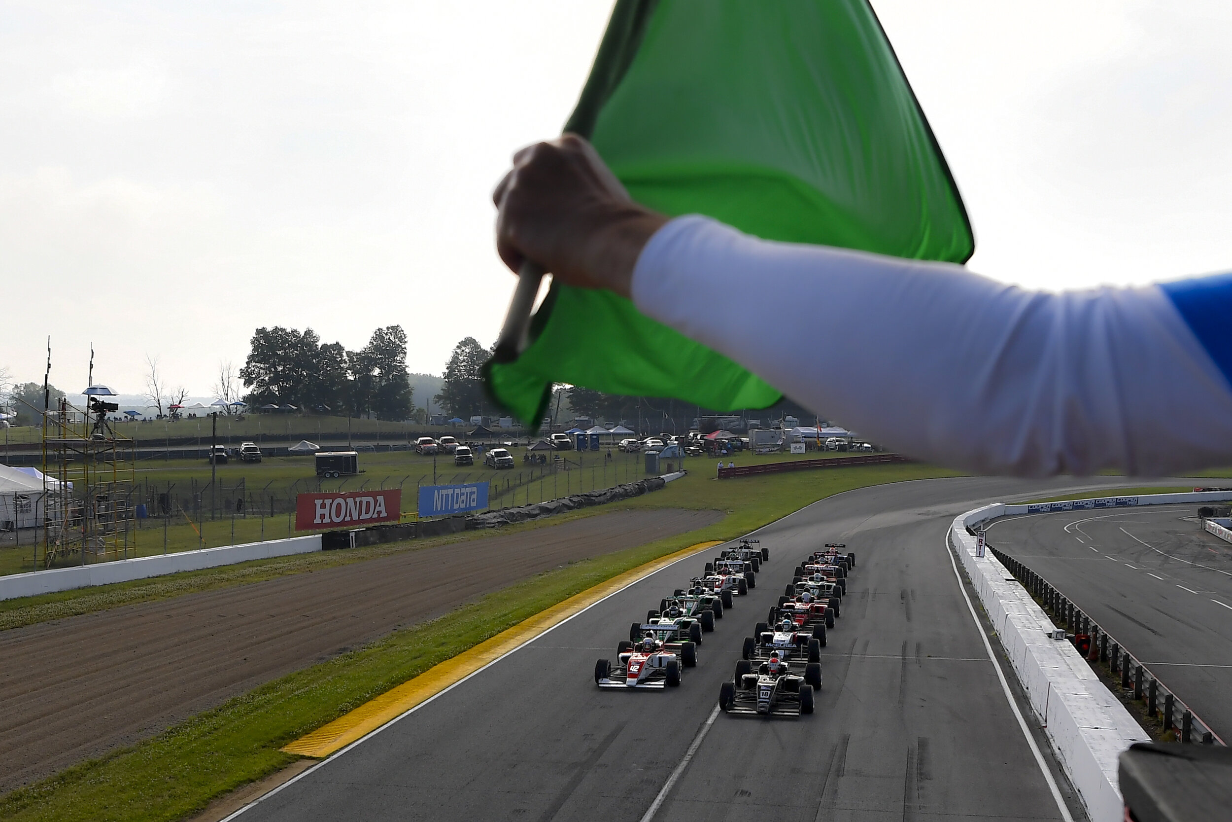 Hunter McElrea leads the field away from the green flag in Race 2. (Gavin Baker Photography/Road to Indy)