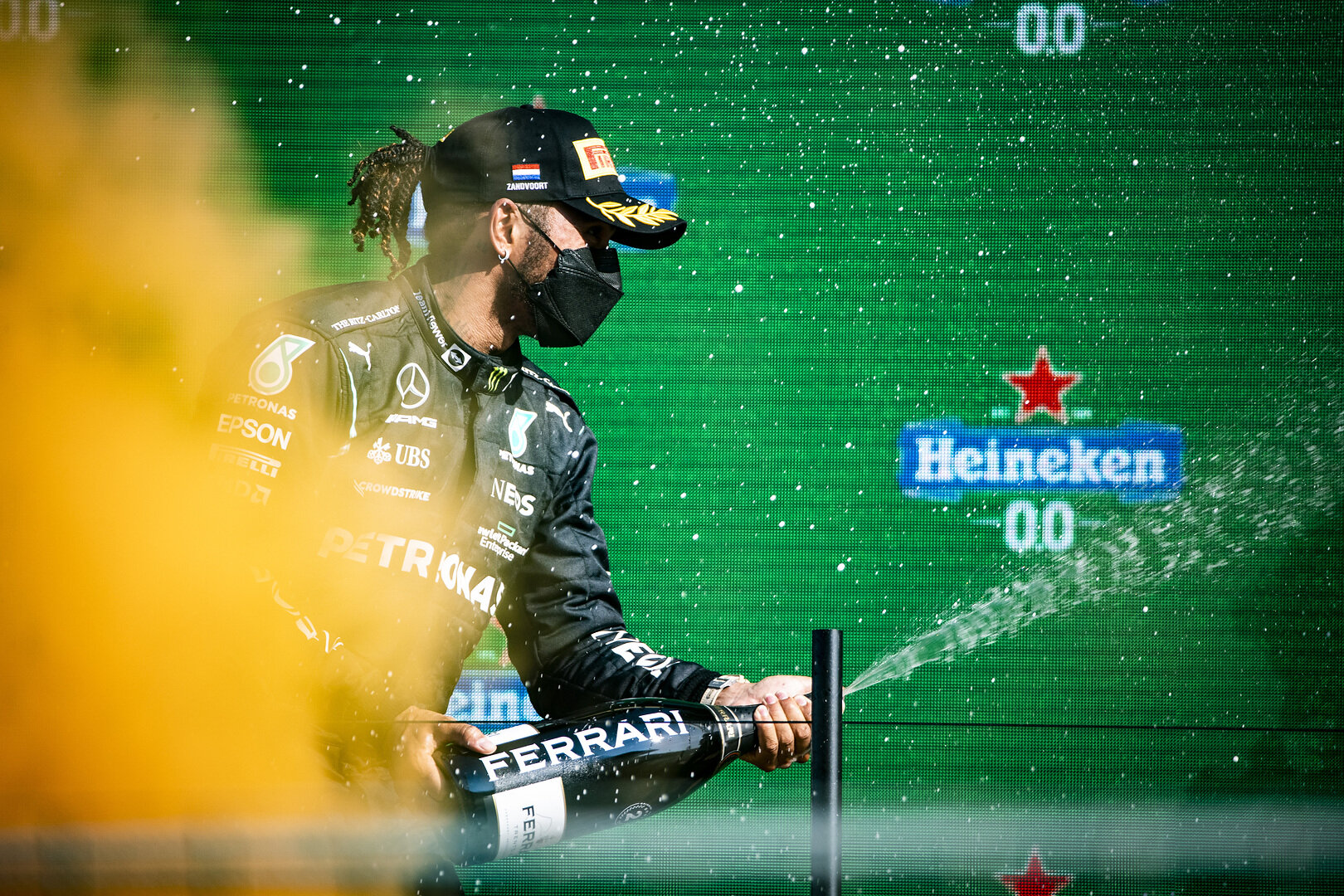 Lewis Hamilton celebrates his race on the podium. (LAT Images)