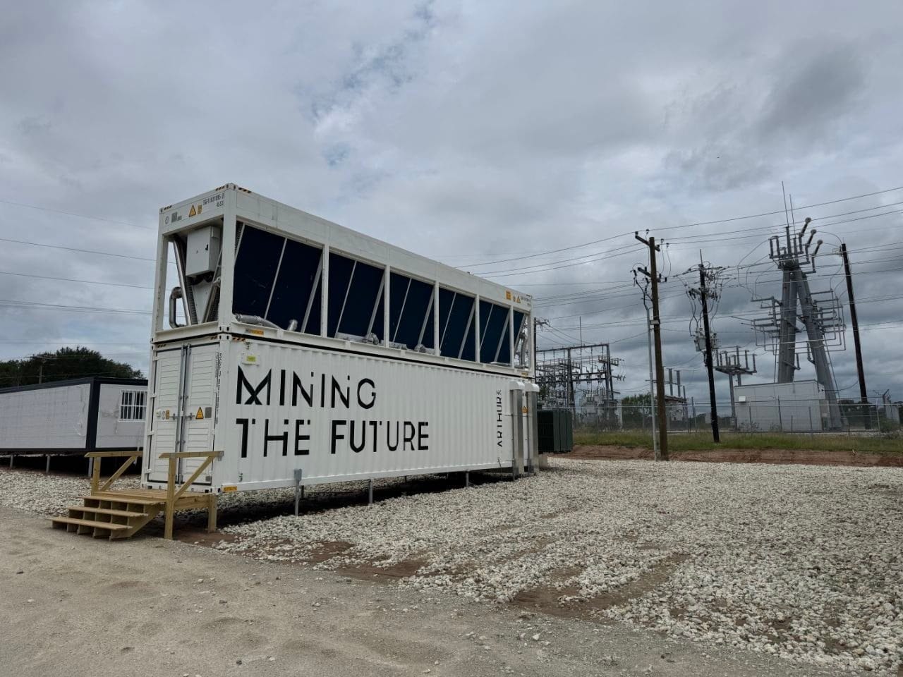 Arthur Mining 'Mining the Future' container beside a substation