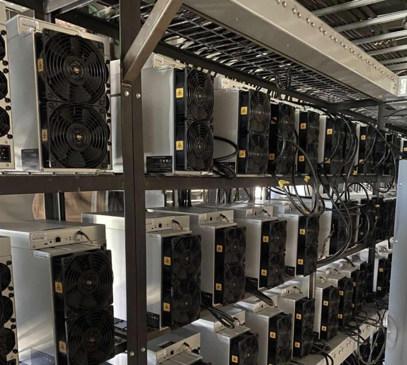 A rack of antminer S19 series bitcoin miners 2022