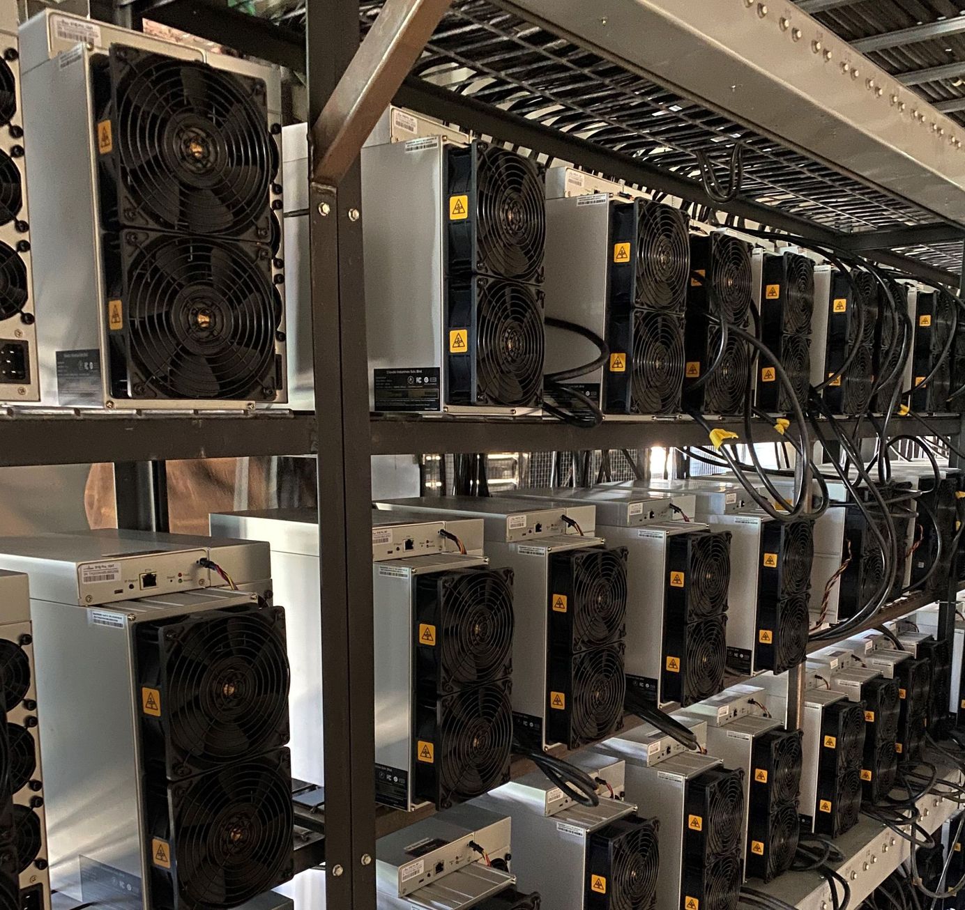 A rack of S19j Pro miners