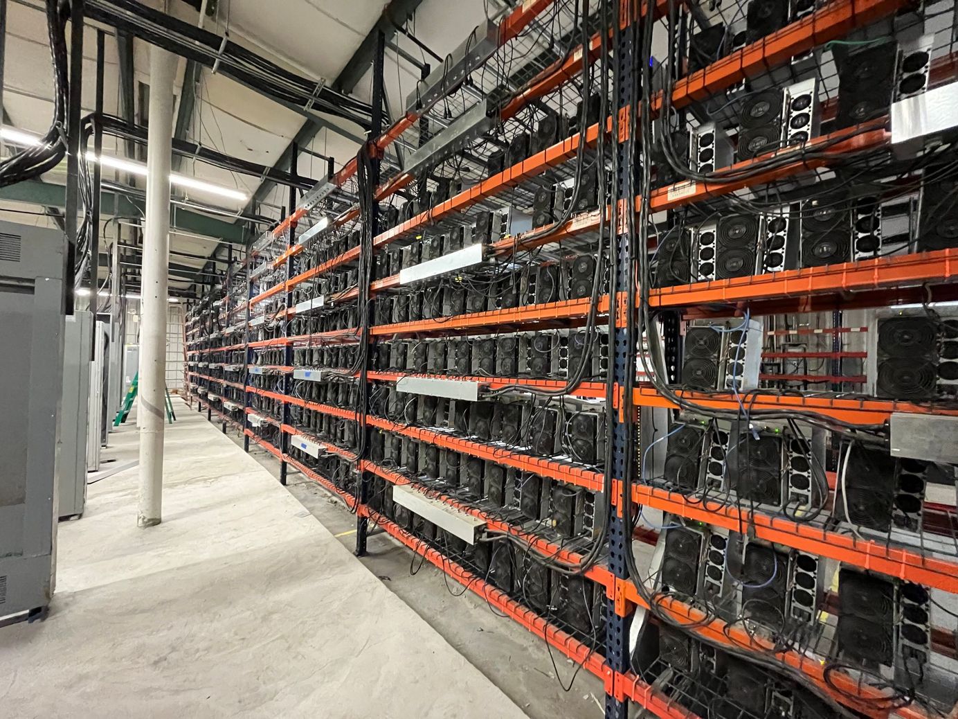 Racks of Bitcoin mining ASICs in a Bitcoin mine in the southeastern US