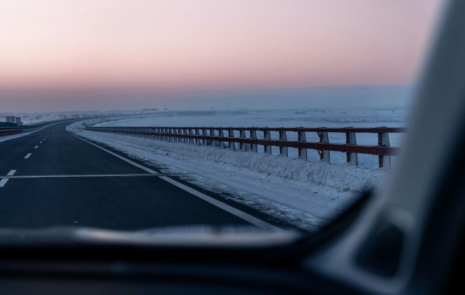 A view of a highway from inside a car