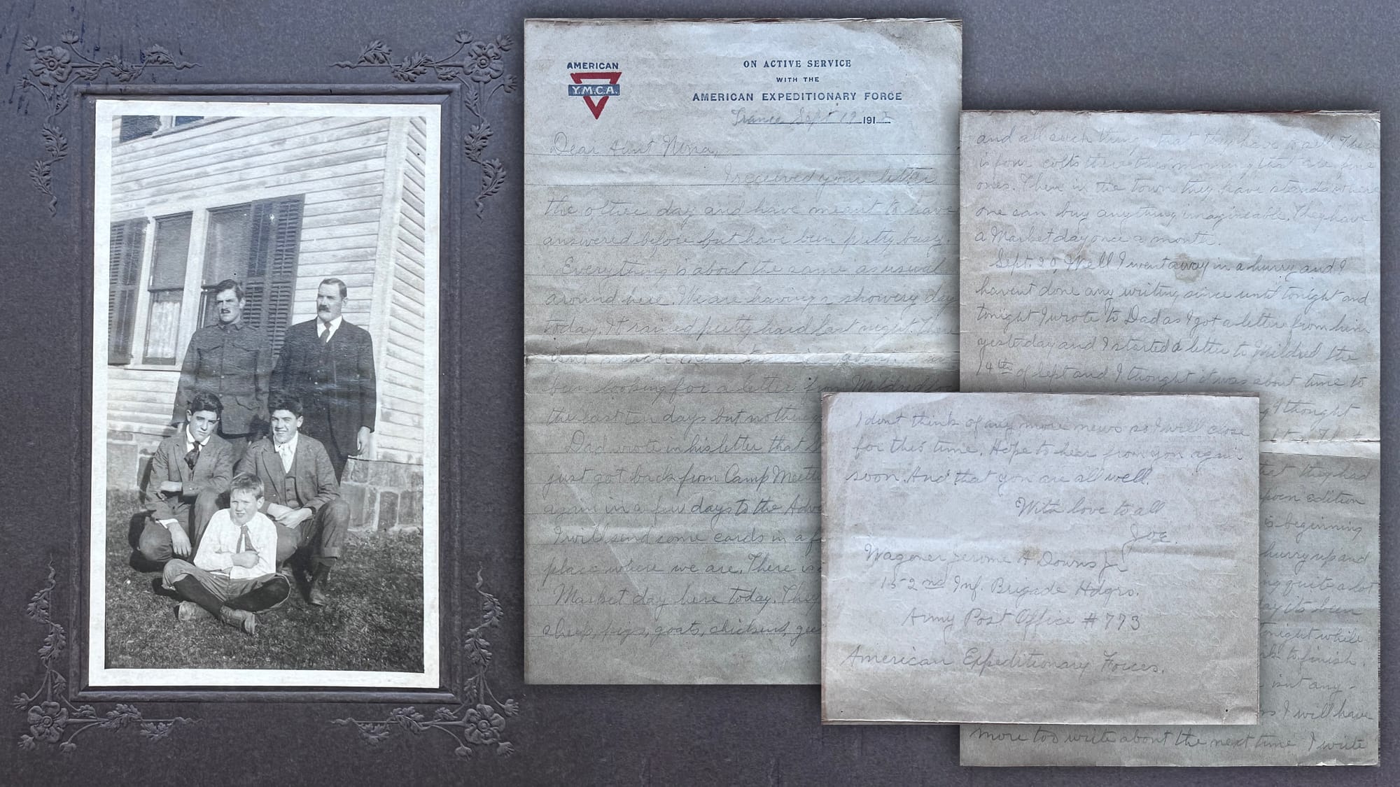 Joe Downs with family and letter