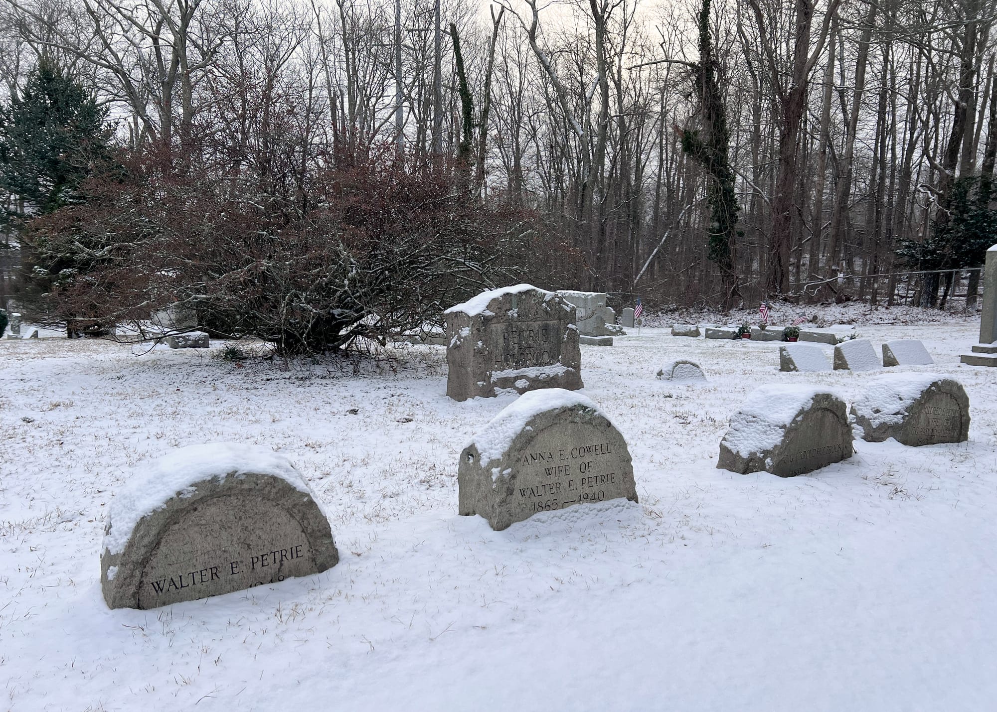 Petrie gravestones at Eastside cemetery in the snow