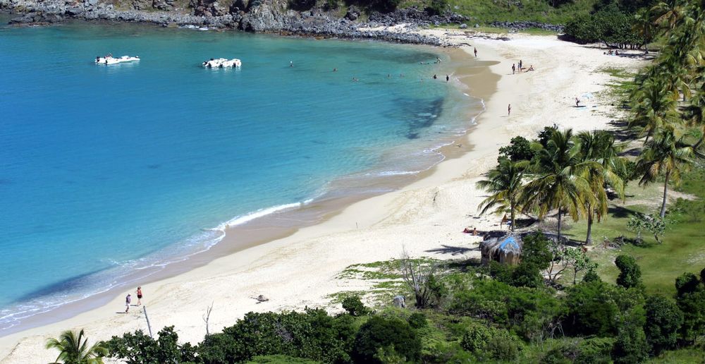 Happy Bay is open to nudist and textile guests