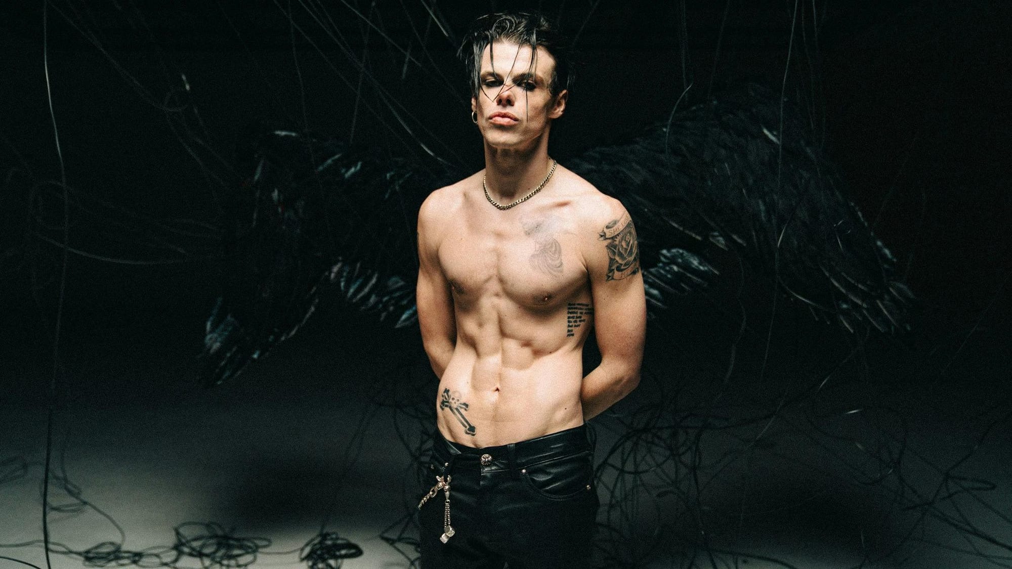 Yungblud Promo Picture with Black Angel Wings | The Metalverse.net