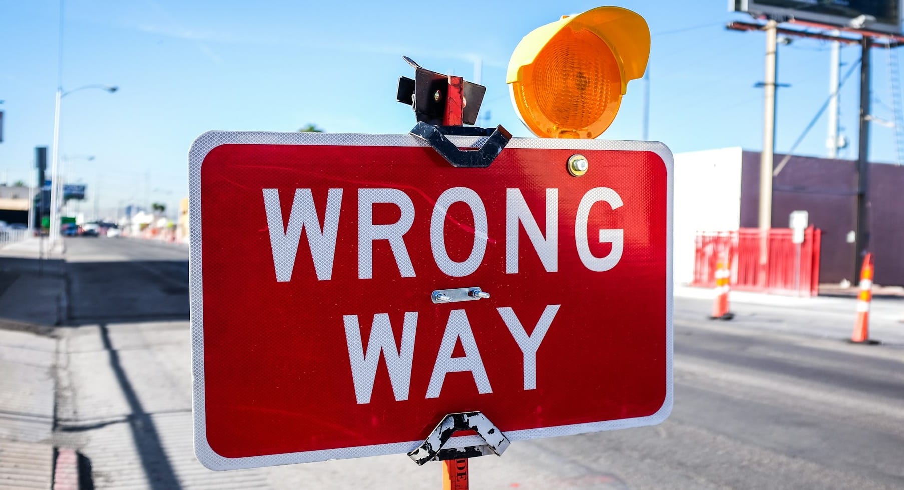 red Wrong Way signage on road