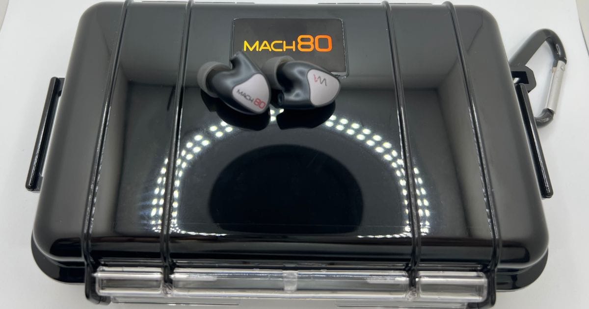 Westone Mach 80 In-Ear Monitor from above, sitting on black case and a white background