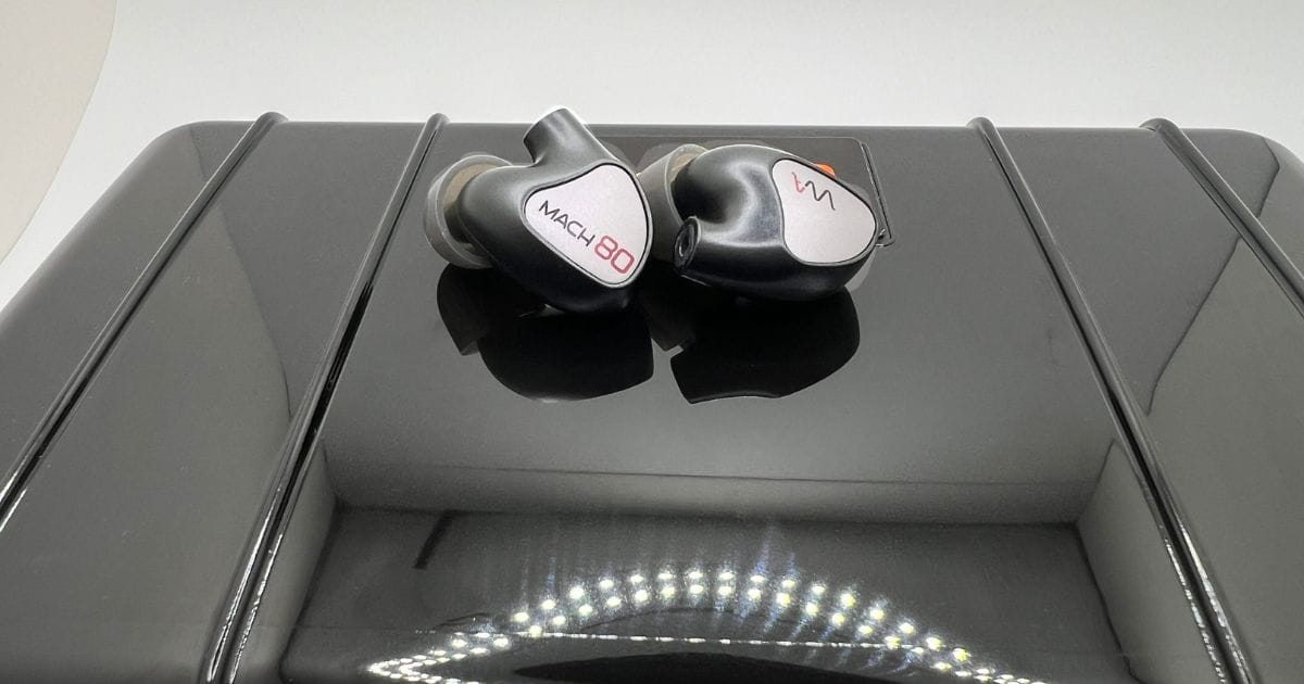 A pair of Westone Mach 80 In-ear monitors sitting on top of a black case