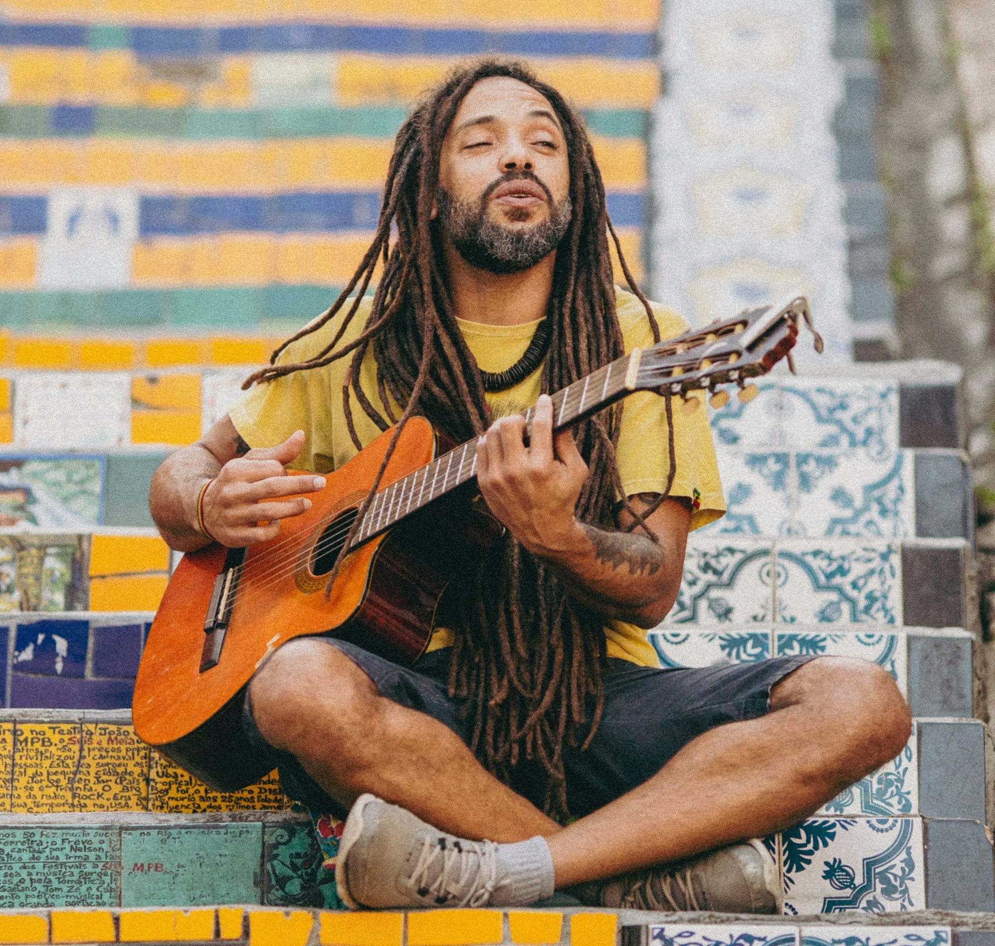 a person playing a guitar