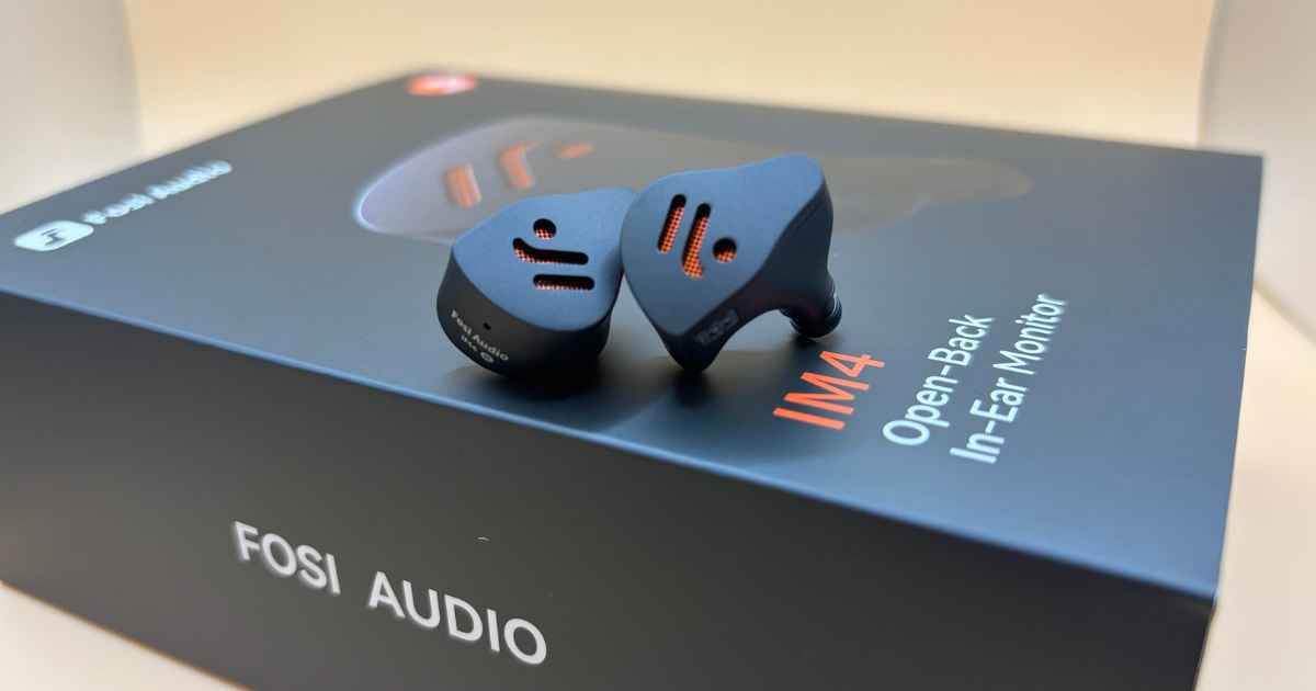 Fosi Audio IM4 Open back headphones sitting on top of original packaging
