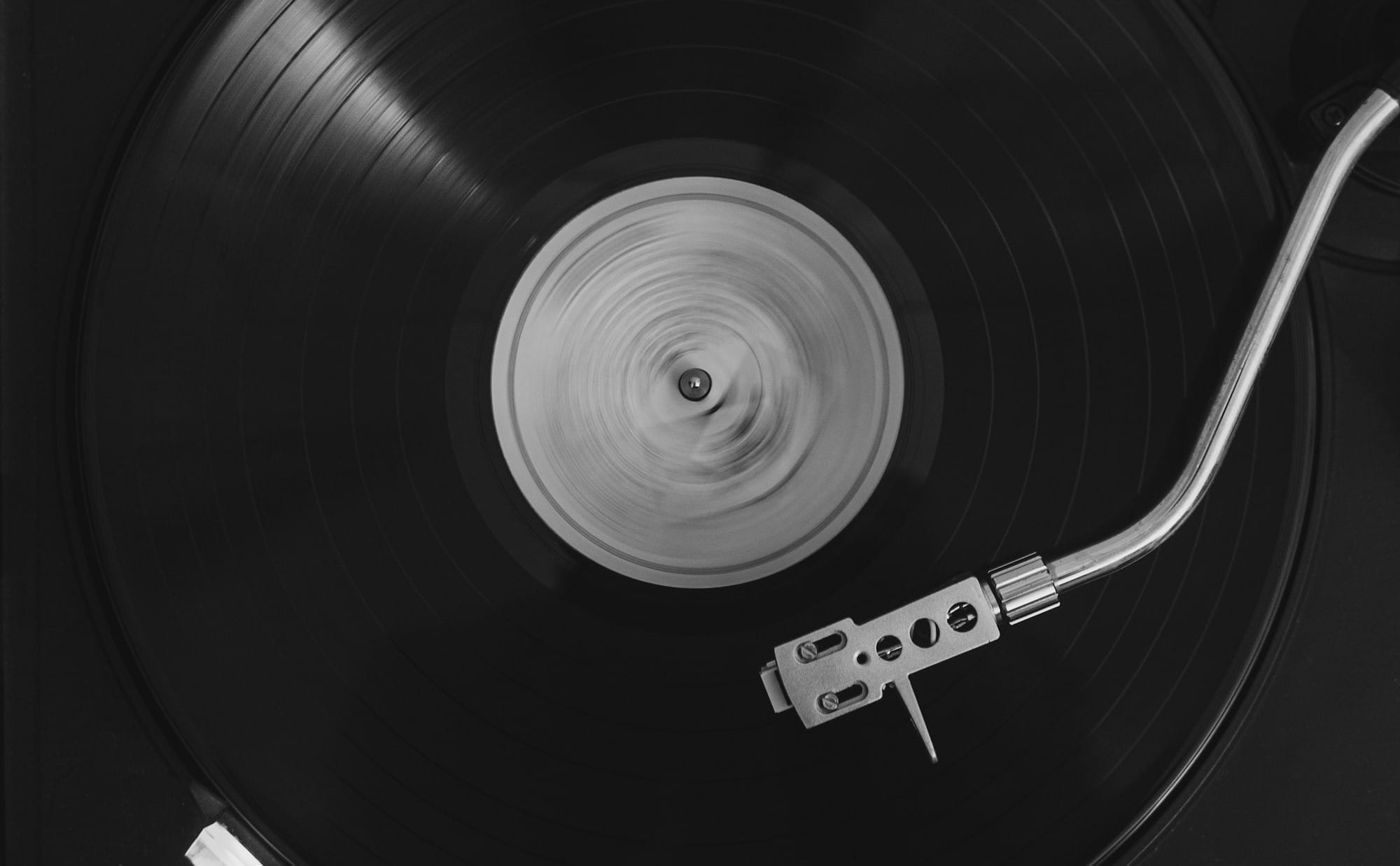 black vinyl record on vinyl record