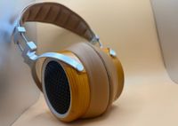 Sivga Luan Headphone sitting against a tan background