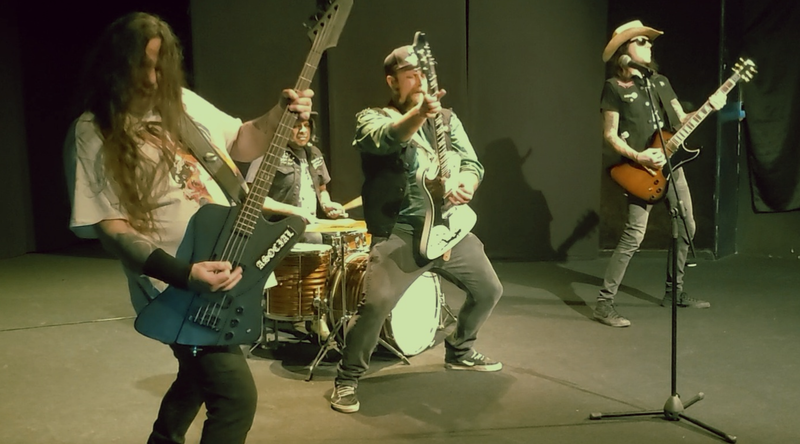Scandinavian Jawbreakers band holding guitars and dancing to new song “She Was Mine”