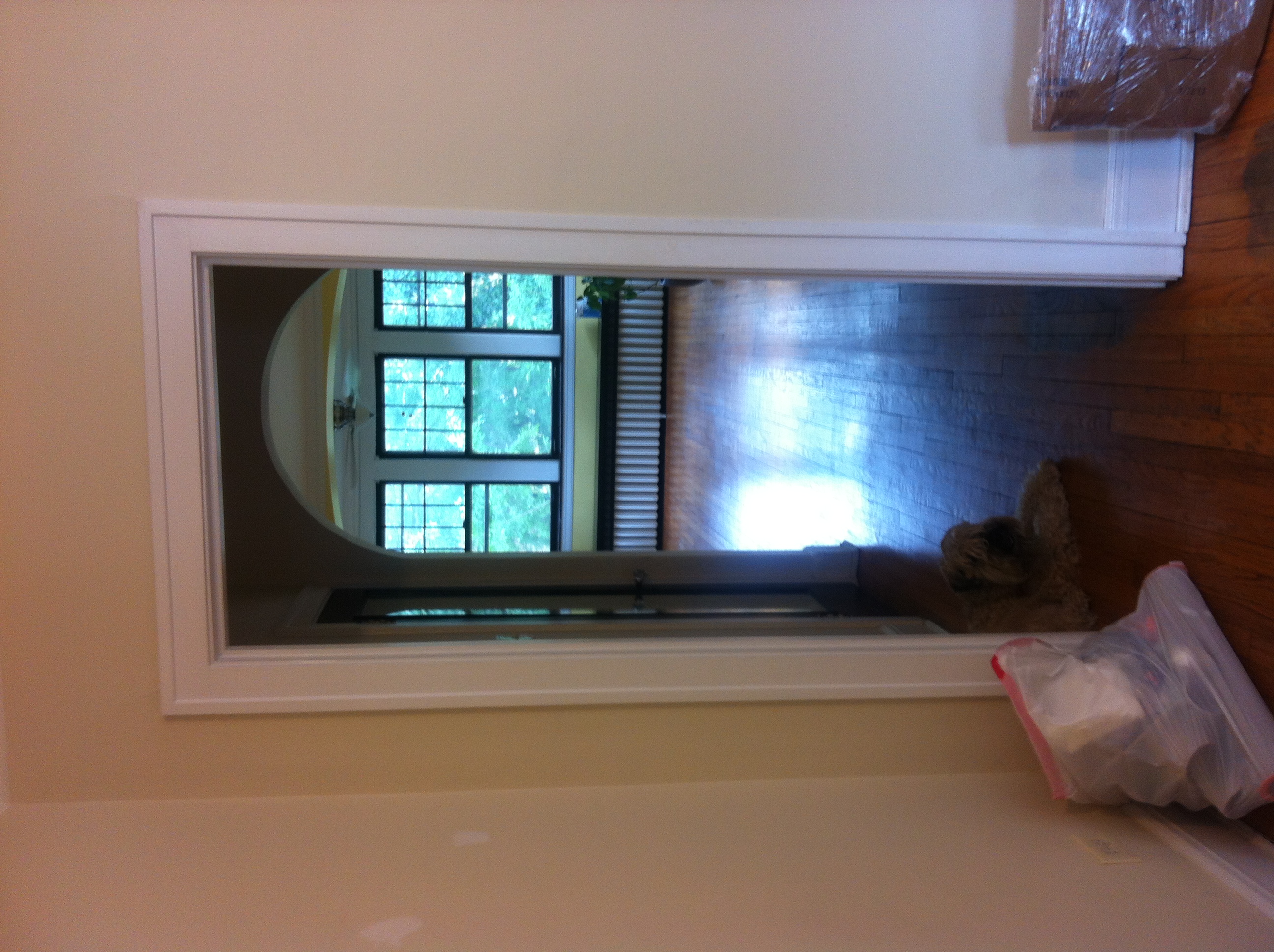 Ella tries not to freak out in the empty apartment