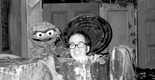 Bill visits Oscar on the set of Sesame Street