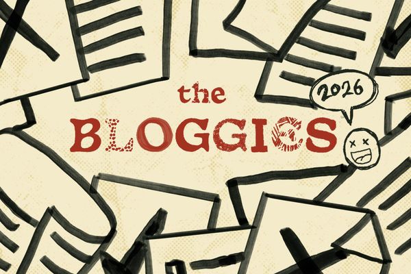 The Bloggies surrounded by papers.