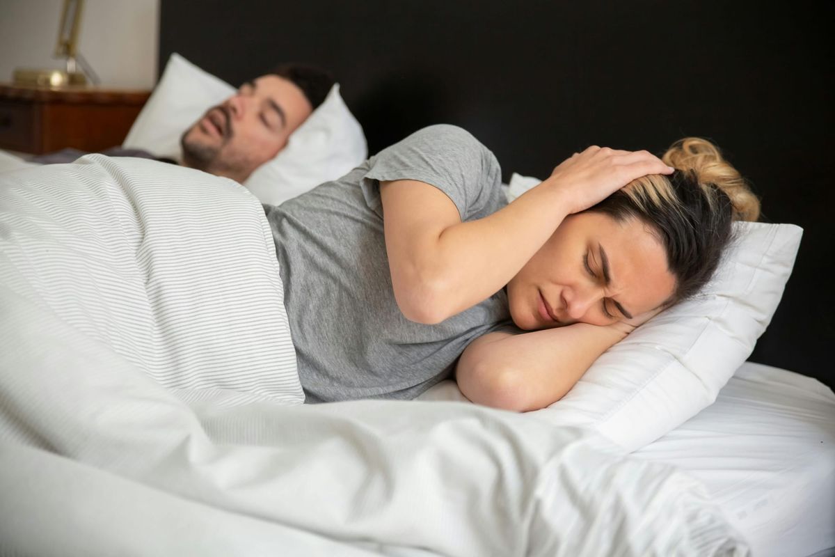 A woman having the worst night sleep of her life