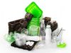 A pile of polyethylene plastic packaging, including food trays, bottles, cups, lids, sauce pots and straws.
