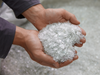 ALPLA-rPET-Flakes-Hand.png