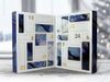 A thick advent calendar folds in the middle to create a compact box. It is propped open to reveal a series of white and…