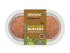 A pack containing plant-based burgers. The packaging is made of transparent plastic with a paperboard sleeve, which reads…