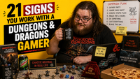 Dungeons & Dragons gamer coworker surrounded by dice, fantasy books, gaming references and office desk accessories on a bright yellow Office Bantomime background.