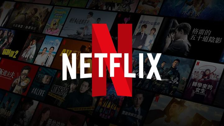 AT THE CROSSROADS: DOES NETFLIX NEED THEATRICAL DISTRIBUTION TO DOMINATE HOLLYWOOD? How Streaming’s Pioneer is Rethinking Its Relationship with the Big Screen ![Netflix at the Movies]