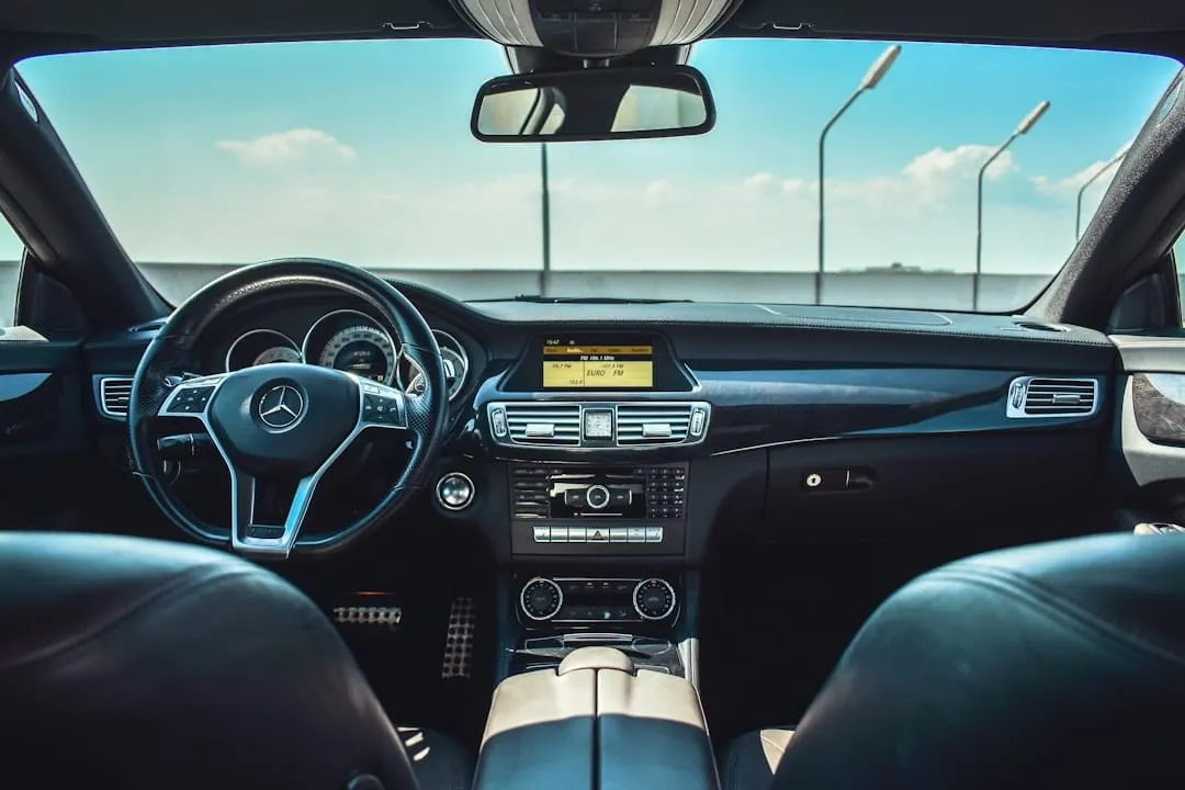 A UK car dashboard — digital service history portals make manufacturer-held records accessible to owners and buyers.
