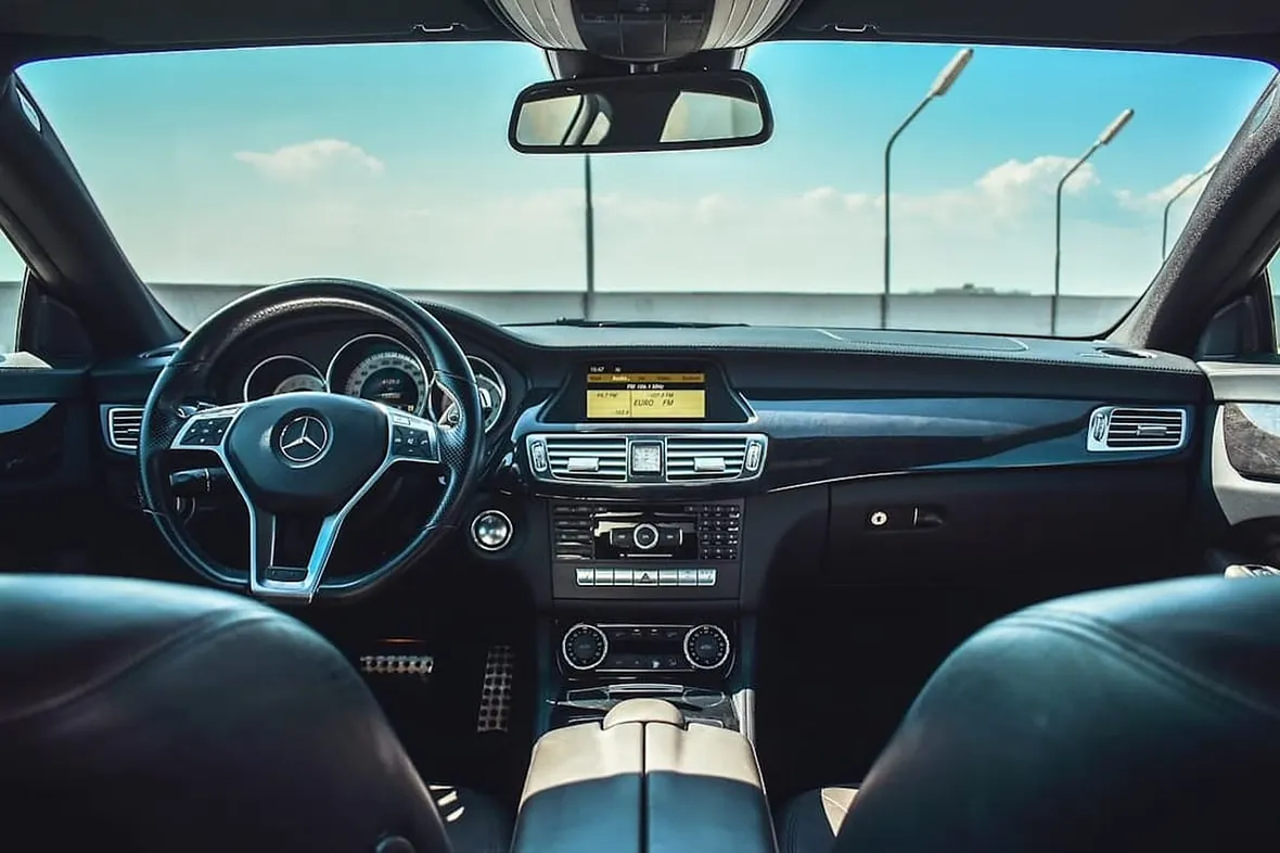 A UK car dashboard, digital service history portals make manufacturer-held records accessible to owners and buyers.