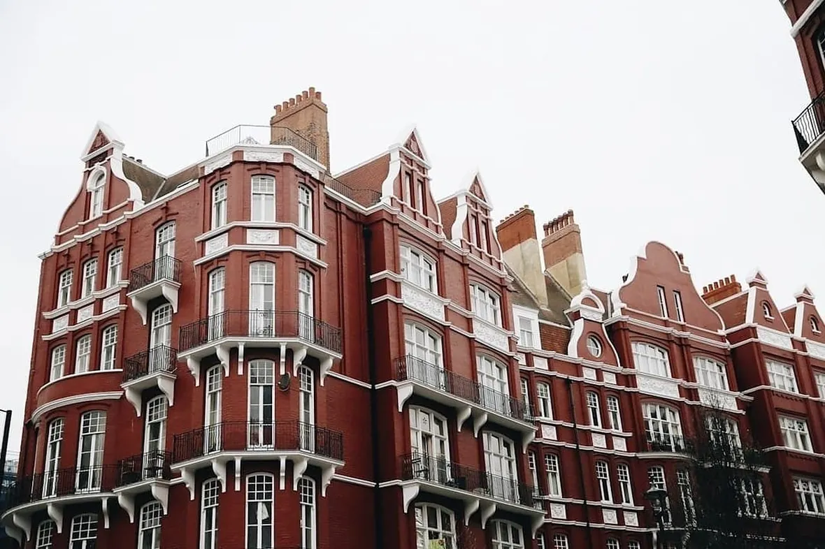 A UK HMO building, LACORS standards define fire safety requirements for houses in multiple occupation, including alarm grades and fire doors.