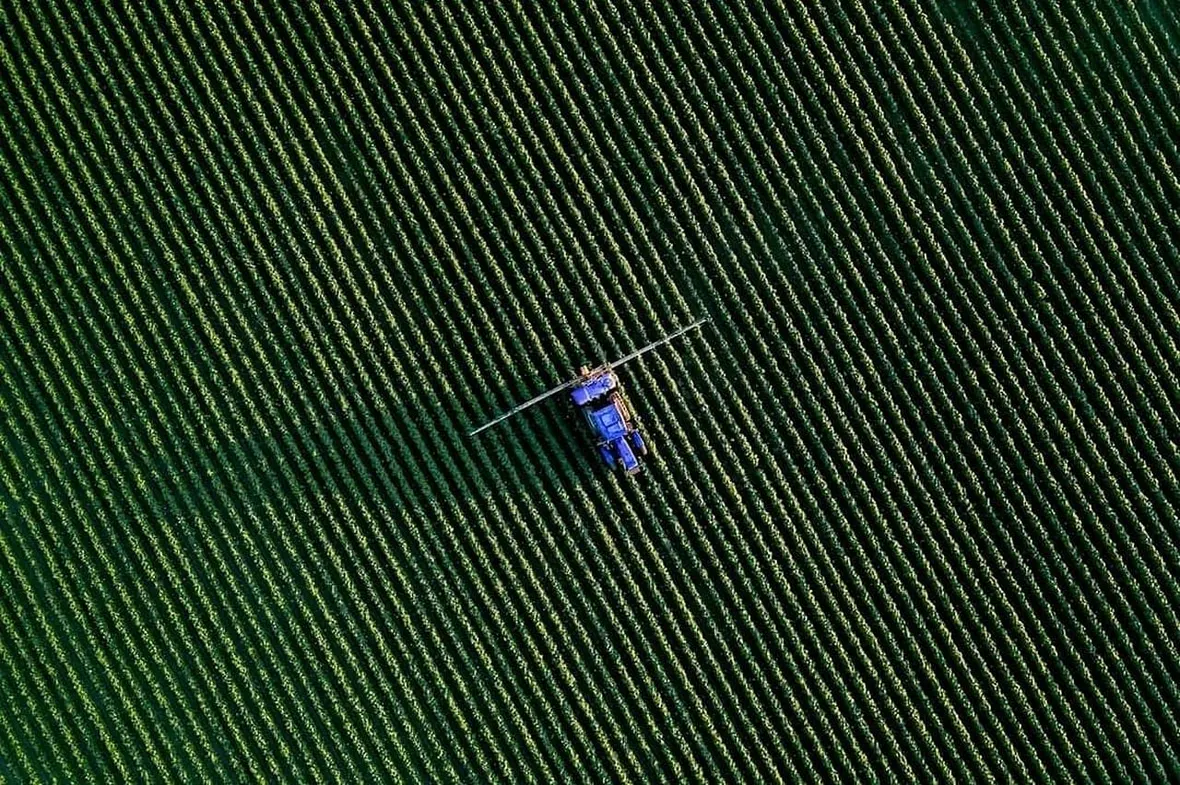 A UK farm crop sprayer, every professional pesticide application must be recorded with product, dose, date and operator.