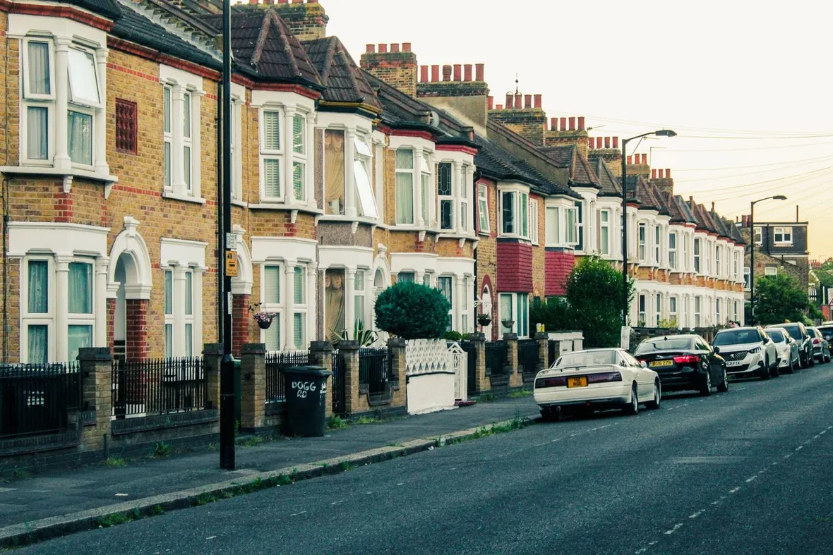 A row of terraced houses with bay windows on a residential street, the sales pack gathers a home's key paperwork before listing.